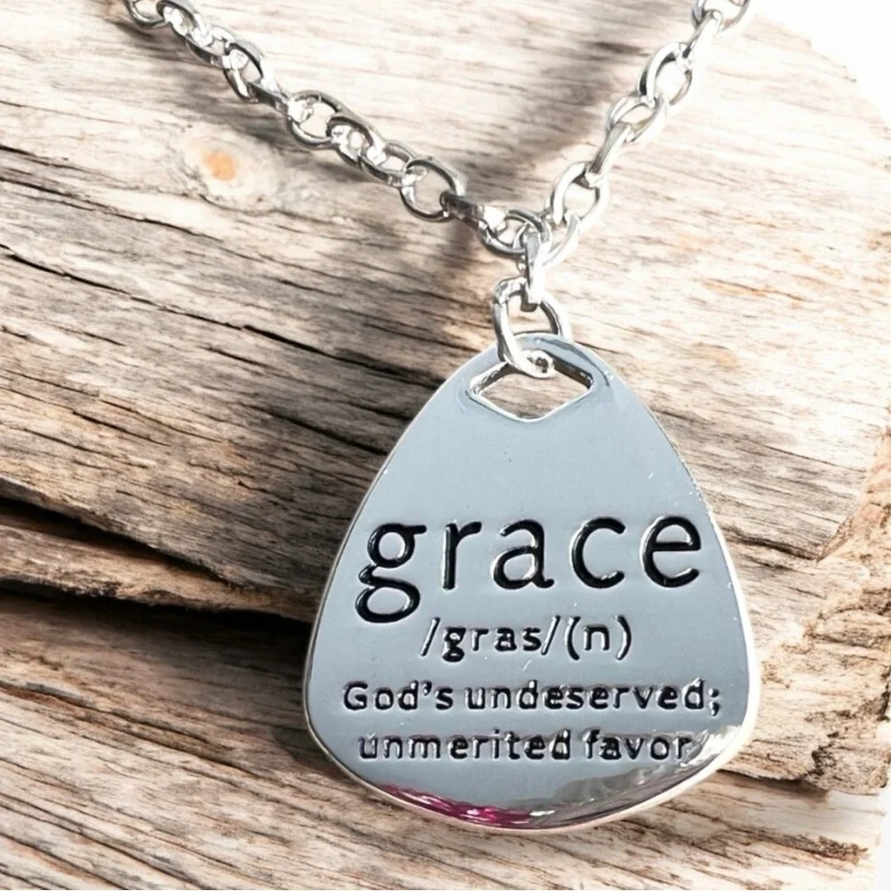 Grace Pendant Necklace in Silver toned and stainless steel. 18” long